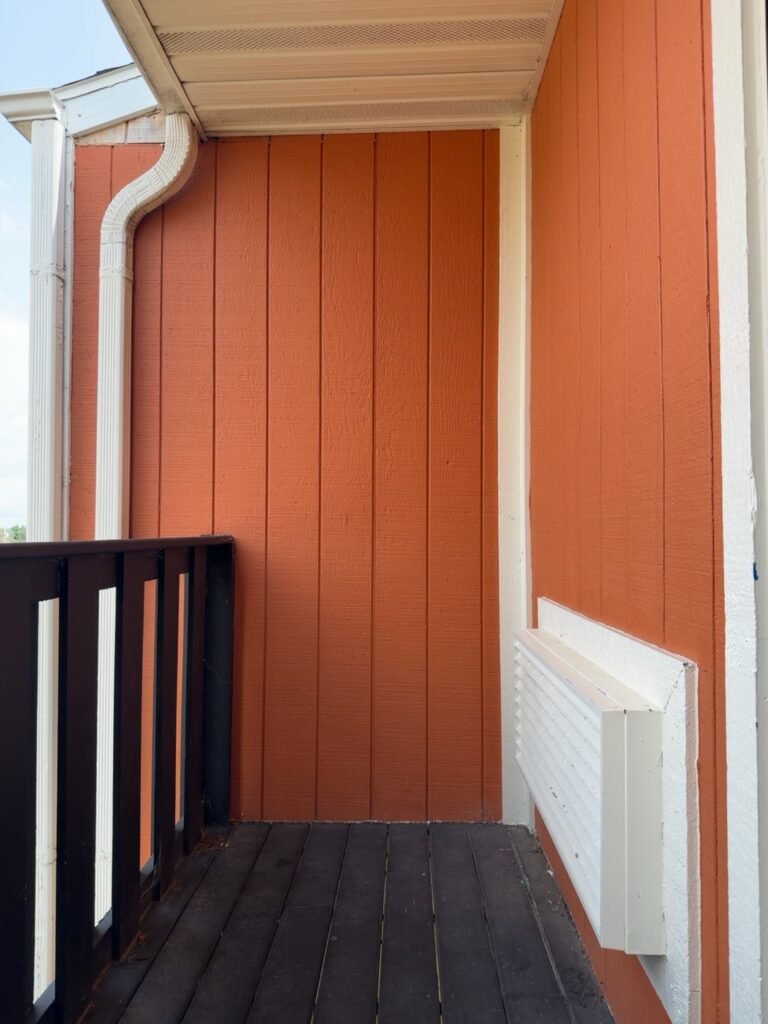 Chicago balcony and exterior railings before repainting, with weathered and peeling paint